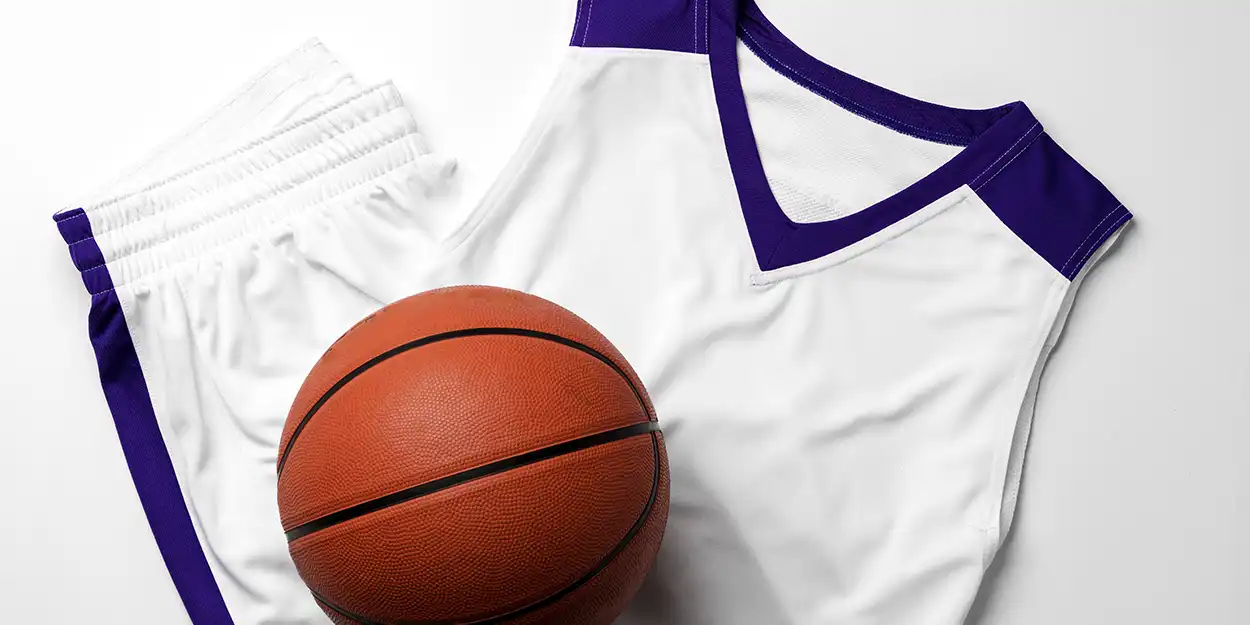 photo of basketball and uniform
